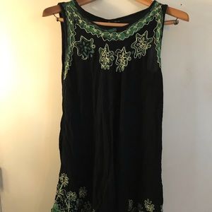 An embroidered black flowy gress